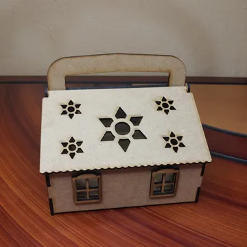 Caja en forma de casa