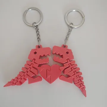 Llavero pareja de dinosaurios